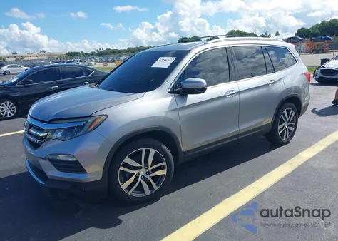 2016 Honda Pilot Touring из США, поврежденный, VIN 5FNYF5H94GB015825